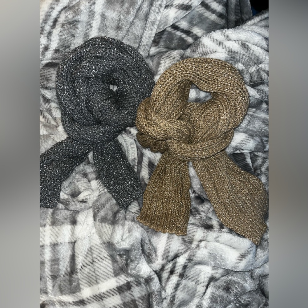 Gold metallic shimmering knit scarf.